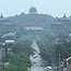 View from the Beijing Drum Tower south to the Coal Hill. To the right the White Dagoba of Beihai Park is visible.