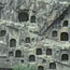 The Fengxian Cave is the biggest of the Longmen caves complex. The central seated Buddha Vairocana is 17 m high. Tang, 672-675.